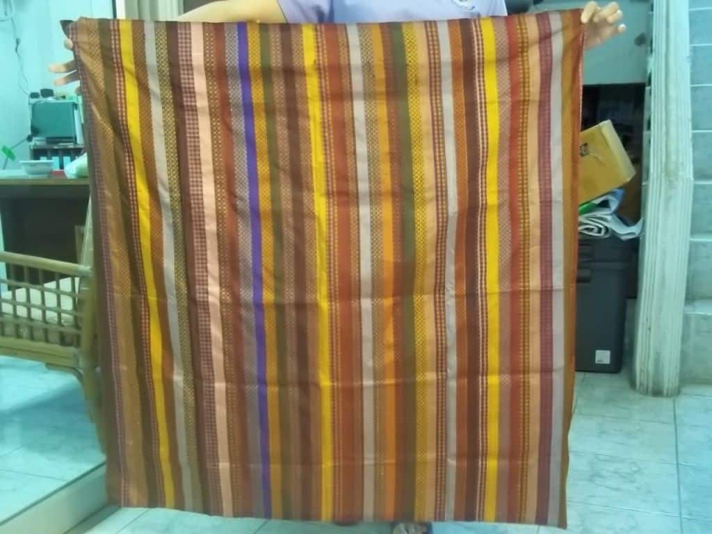 Similar to what will be unveiled at the show, this Thai silk was woven by a microcredit client of our partner Small Enterprise Development Co. in Thailand