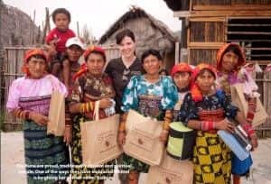 6 Kuna Women from Panama pose with Naomi from Reserveage Nutrition 