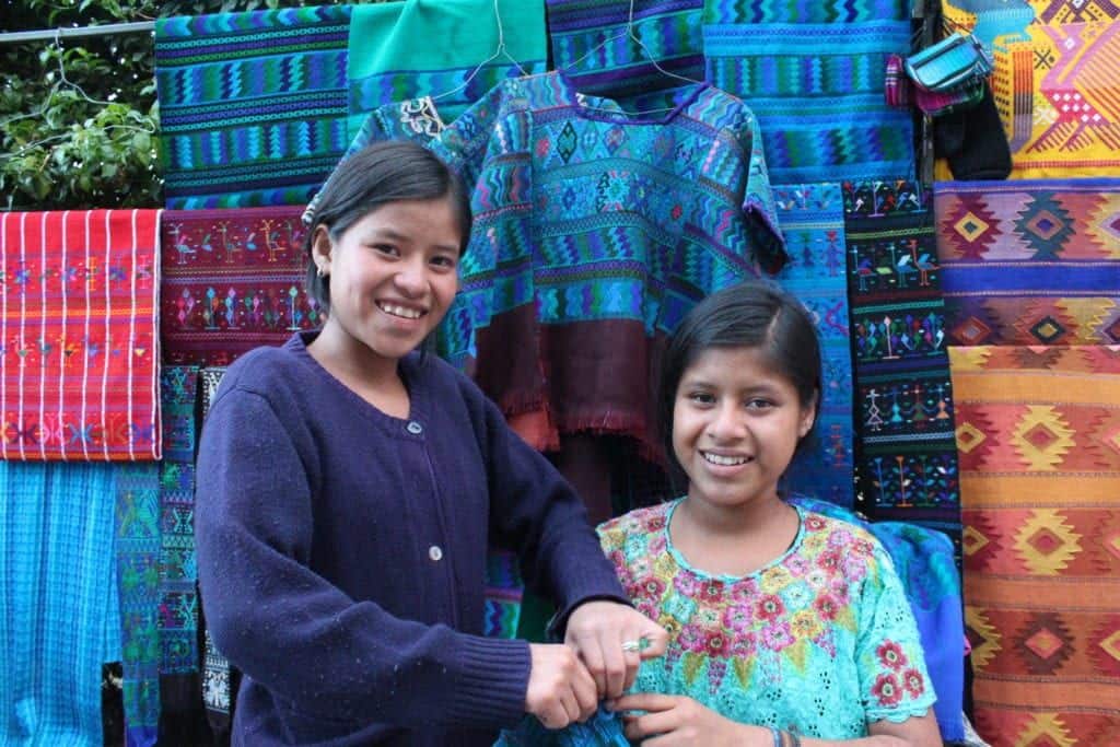 guatemalan women with textiles