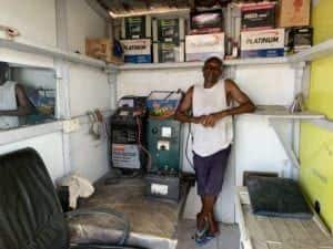 A man standing in his shop in ghana