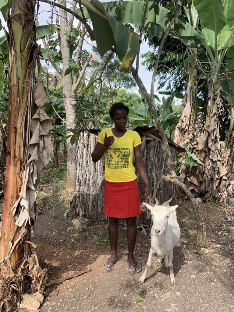 a woman with her goat